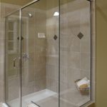 Glass shower doors with tile shower